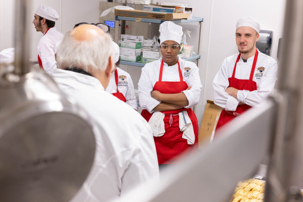 two student culinary students in the kitchen